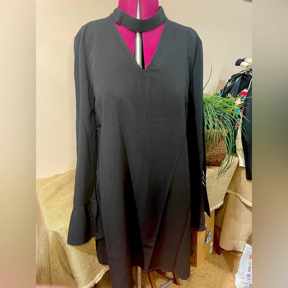 Very J ladies black long sleeved swing dress with silver accents on bell sleeve